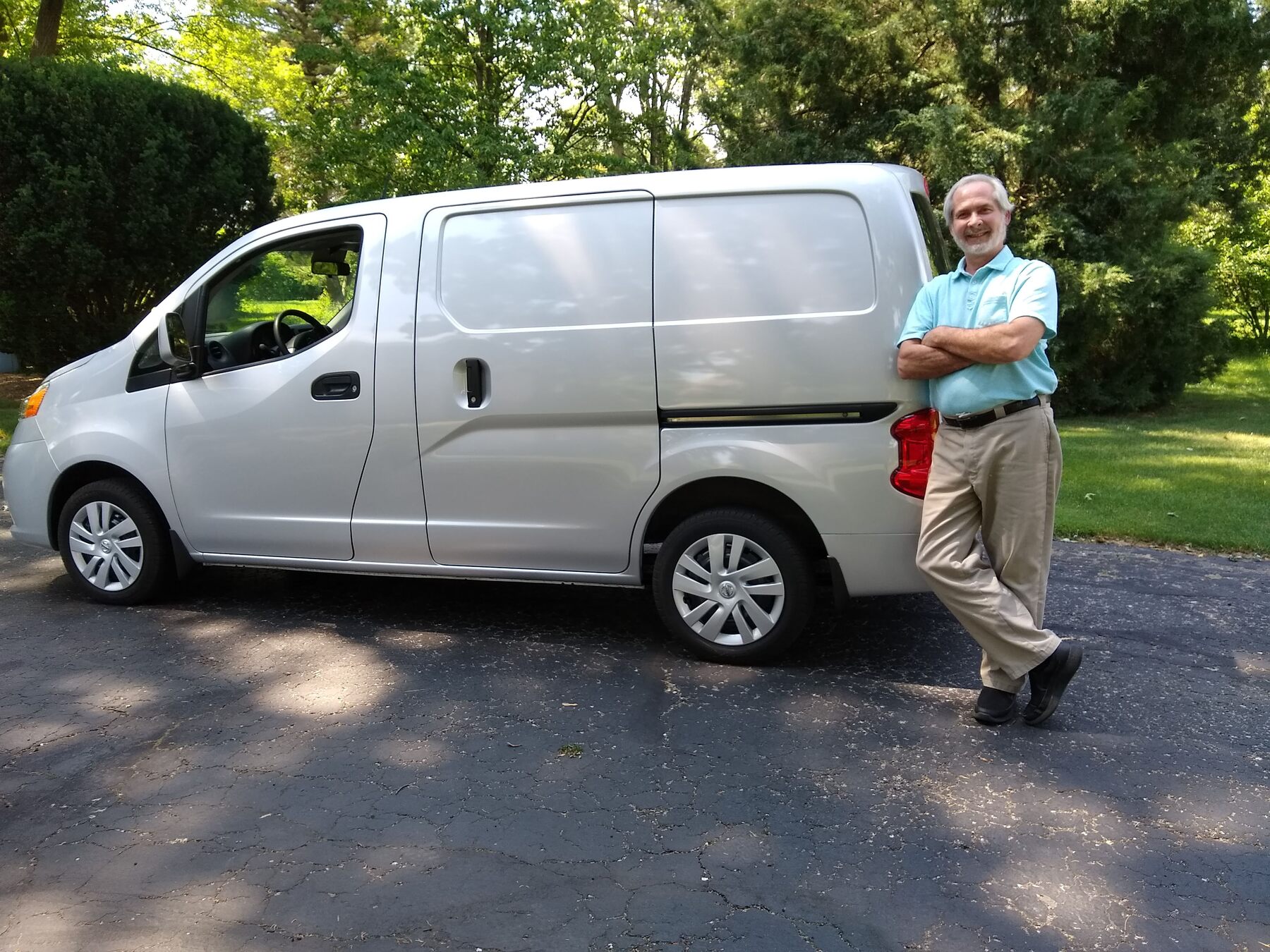 Chuck Addy with White Service Van image